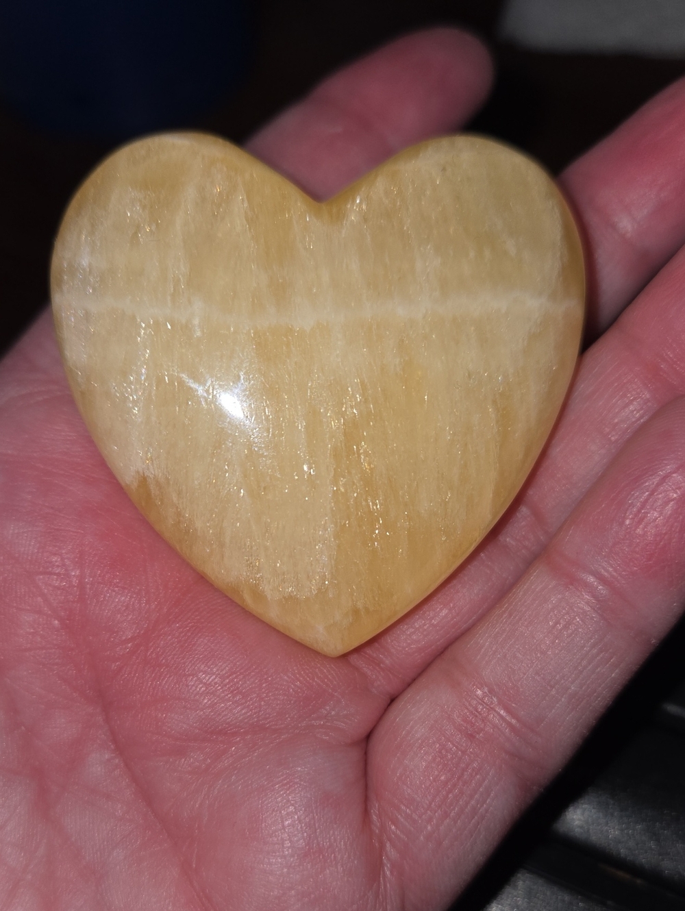 Polished Yellow Calcite Heart Palm Stone